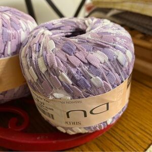 four skeins Sirdar Dune Frosted Violet crochet thread